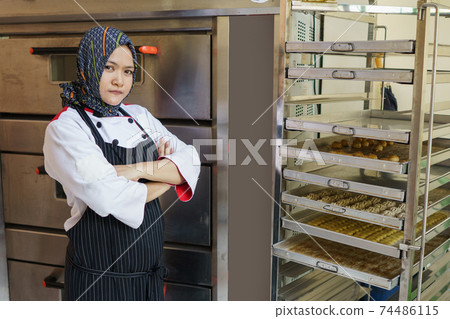 bakery shop owner female muslim chef 74486115