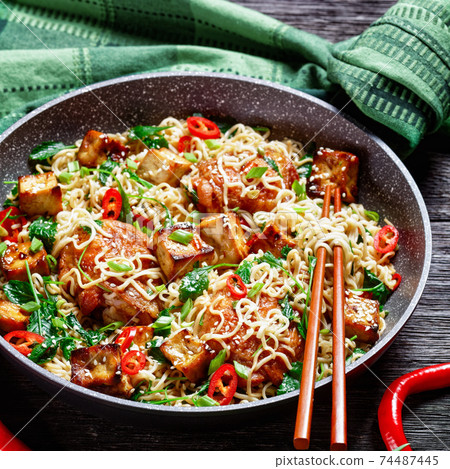 Sweet and sour tofu, chicken, and wok noodles 74487445