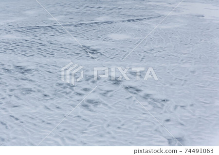 Fumon of Lake Mashu that has frozen all over 74491063