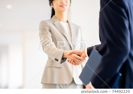 Business woman shaking hands "LINK FOREST" shooting cooperation Business woman shaking hands "LINK FOREST" shooting cooperation 74492220