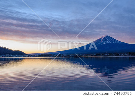 Light cloudy sky at dawn and upside-down red Fuji Light cloudy sky at dawn and upside-down red Fuji 74493795