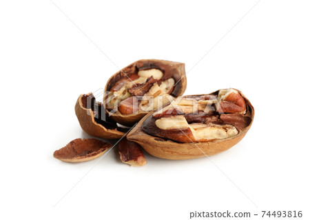 Tasty pecan nuts isolated on white background Tasty pecan nuts isolated on white background 74493816