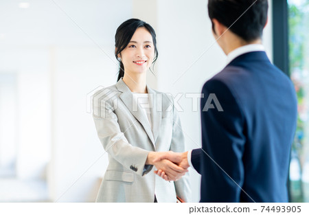 Business woman shaking hands "LINK FOREST" shooting cooperation Business woman shaking hands "LINK FOREST" shooting cooperation 74493905