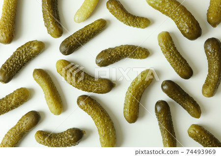 Flat lay with pickled cucumbers on white background 74493969
