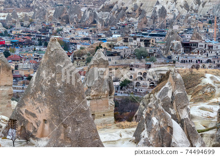 Landscape view of Uchisar, Cappadocia, Turkey under cloudy sky 74494699