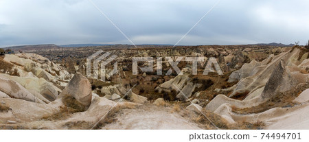 Landscape view of Uchisar, Cappadocia, Turkey under cloudy sky 74494701