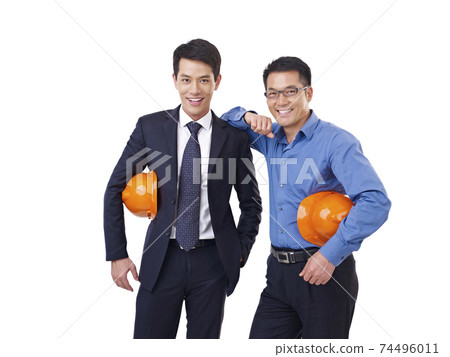 portrait of two asian men with orange safety hat, isolated on white 74496011