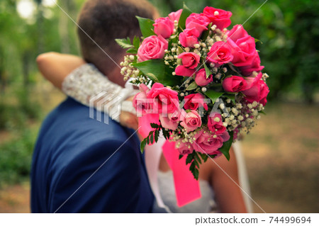nice wedding bouquet in bride's hand 74499694