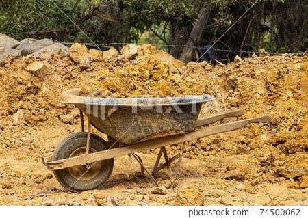 Clay extraction process at a traditional ceramics factory at the small city of Raquira. The city of pots, Colombia Clay extraction process at a traditional ceramics factory at the small city of Raquira. The city of pots, Colombia 74500062