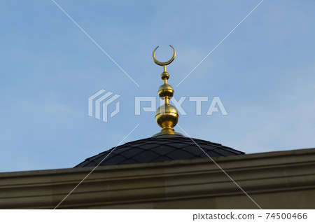 Dome of mosque with a signs of crescent and star. The Ar-Rahma Mosque Dome of mosque with a signs of crescent and star. The Ar-Rahma Mosque 74500466