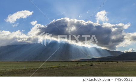 Dramatic mountain landscape near Castelluccio village in National Park Monte Sibillini, Umbria region, Italy 74500532