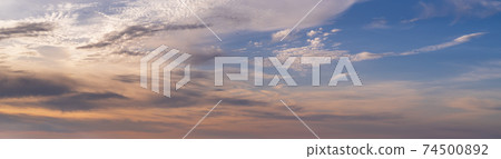 Colorful evening sky with clouds panorama background 74500892