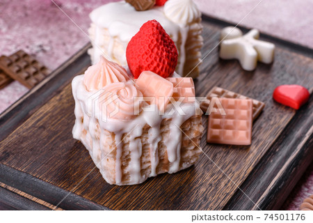 Beautiful colorful bright soap made in the form of an appetizing cake 74501176
