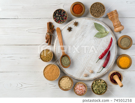 Variety of herbs on white wooden background Variety of herbs on white wooden background 74501258
