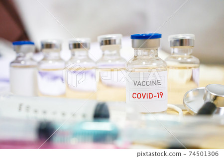 Vaccine and syringe injection. It use for prevention, immunization and treatment from corona virus infection. 74501306