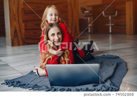 Beautiful mother with a little daughter Beautiful mother with a little daughter 74502808