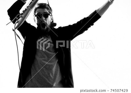 Musician with guitar rock star emotions entertainment modern performer Musician with guitar rock star emotions entertainment modern performer 74507429