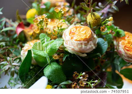 Up of a bouquet of orange roses Up of a bouquet of orange roses 74507951