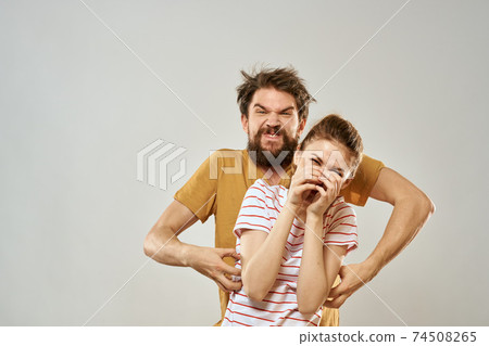 Young couple socializing romance lifestyle fashion fun light background Young couple socializing romance lifestyle fashion fun light background 74508265