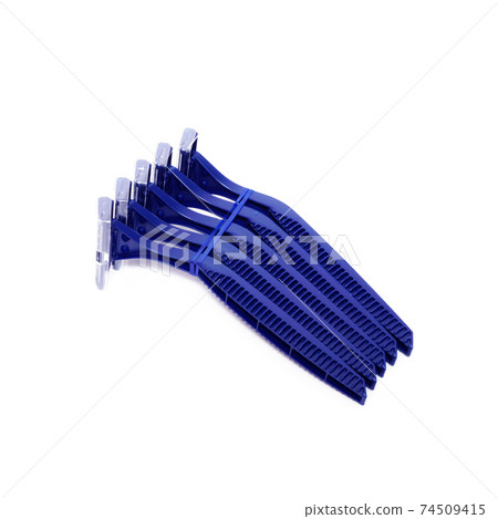 Packaging blue disposable razor blade isolated on white background 74509415