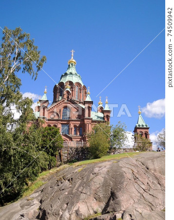 Exterior view of Uspensky Temple in Helsinki, Finland 74509942