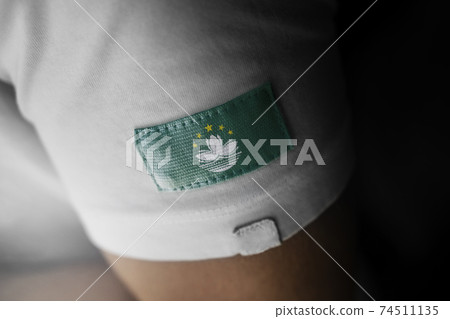 Patch of the national flag of the Macao on a white t-shirt 74511135