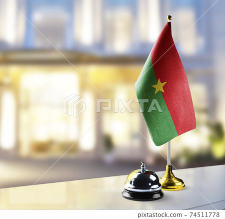 Burkina Faso flag on the reception desk in the lobby of the hotel Burkina Faso flag on the reception desk in the lobby of the hotel 74511778