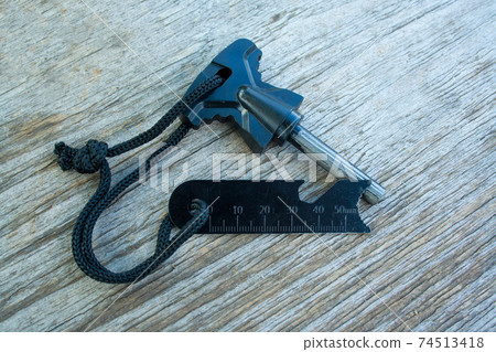 Flames on a wooden background Flames on a wooden background 74513418