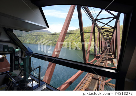 AT-400 observation car crossing the Yagan Railway and Yunishigawa Bridge AT-400 observation car crossing the Yagan Railway and Yunishigawa Bridge 74518272