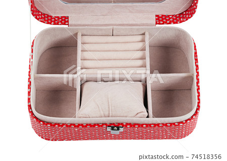 Open red jewelry box adorned with glittering jewels 74518356