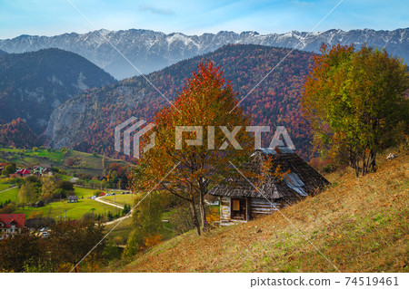 Beautiful autumn landscape with Magura village, Brasov county, Transylvania, Romania Beautiful autumn landscape with Magura village, Brasov county, Transylvania, Romania 74519461