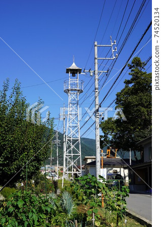 A half bell on the fire lookout tower that convenes a rural fire brigade 74520134