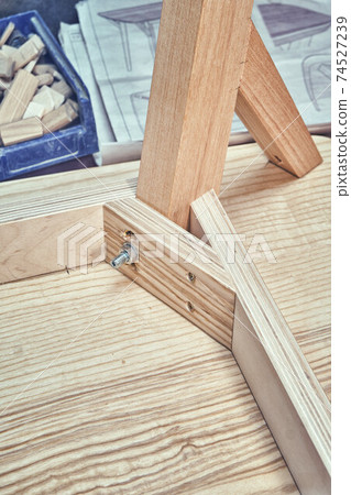 Table corner of plywood, veneer and solid ash in workshop Table corner of plywood, veneer and solid ash in workshop 74527239