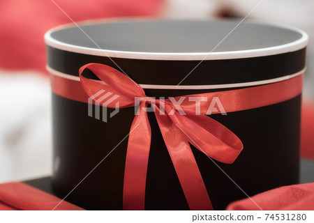 gift surprise box with red ribbon gift surprise box with red ribbon 74531280