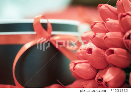 gift surprise bouquet red tulips gift surprise bouquet red tulips 74531283