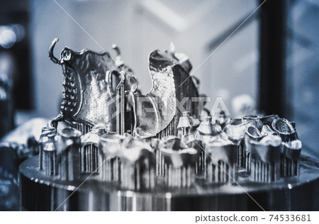 Object printed on metal 3d printer close-up Object printed on metal 3d printer close-up 74533681