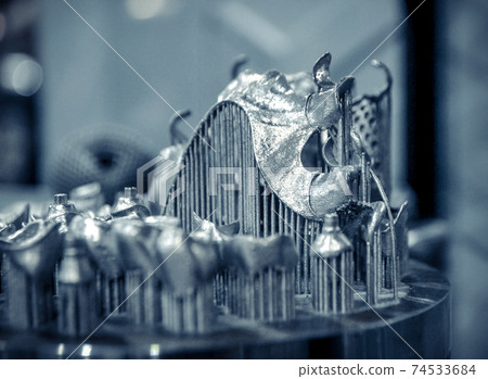 Object printed on metal 3d printer close-up 74533684