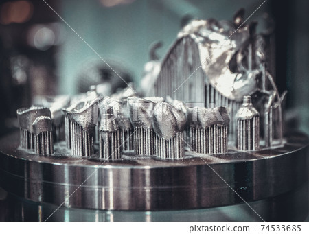 Object printed on metal 3d printer close-up. Object printed on metal 3d printer close-up. 74533685