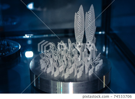 Object printed on metal 3d printer close-up Object printed on metal 3d printer close-up 74533706