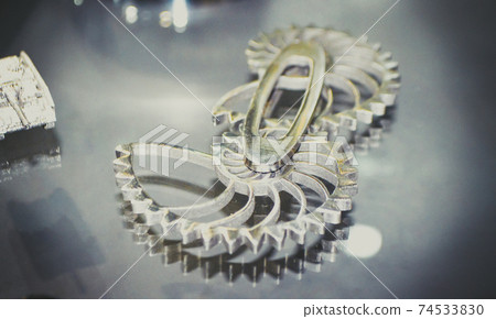 Object printed on metal 3d printer close-up. 74533830