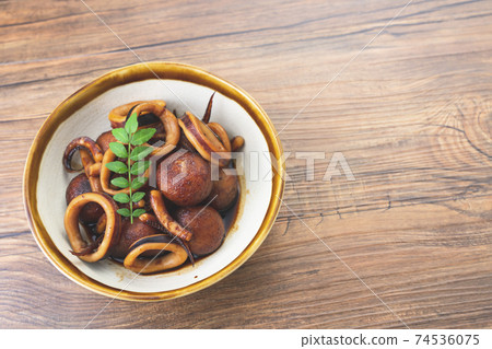 Delicious squid and taro simmered sweet and spicy Delicious squid and taro simmered sweet and spicy 74536075