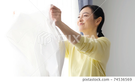 Housewives with laundry Housewives with laundry 74536569