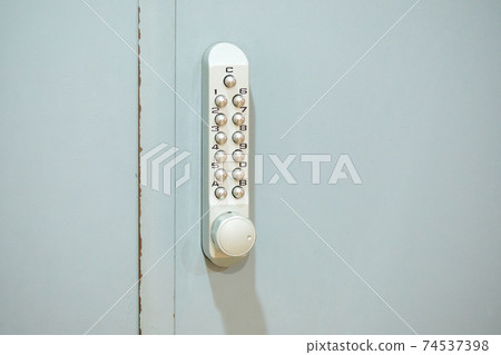 Auxiliary entrance lock with push button for PIN photo material 74537398