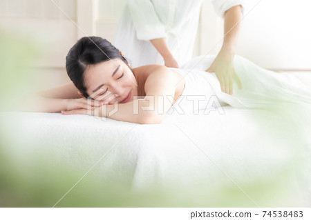 woman getting a massage 74538483