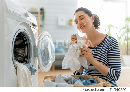 woman is doing laundry 74540891