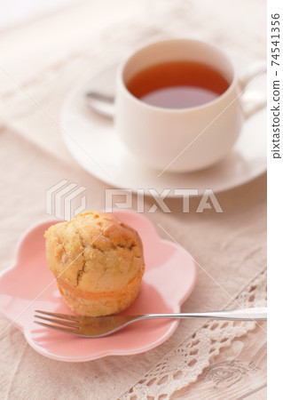 Tea time with tea and muffins 74541356