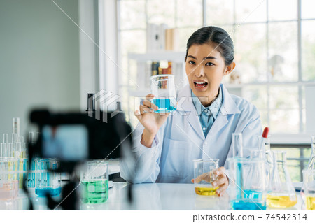 Young doctor blogging and creating video Young doctor blogging and creating video 74542314