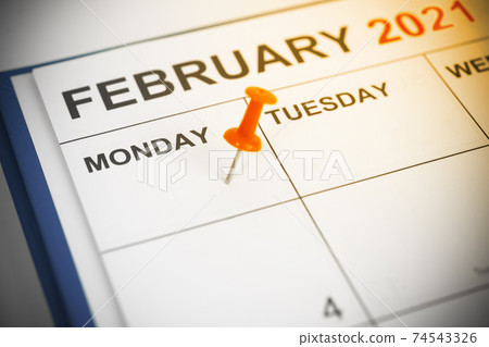 Red pin on calendar Monday Red pin on calendar Monday 74543326