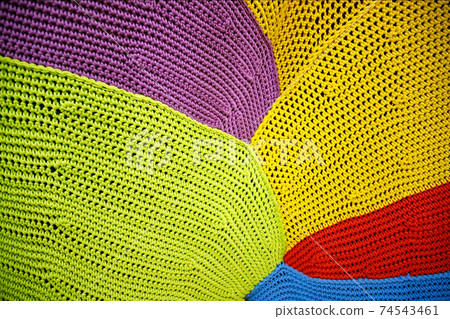 Crochet pattern, a close up of a simple colorful knitting pattern for background Crochet pattern, a close up of a simple colorful knitting pattern for background 74543461