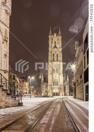 Saint Bavo Cathedral of Ghent during snowfall Saint Bavo Cathedral of Ghent during snowfall 74543856
